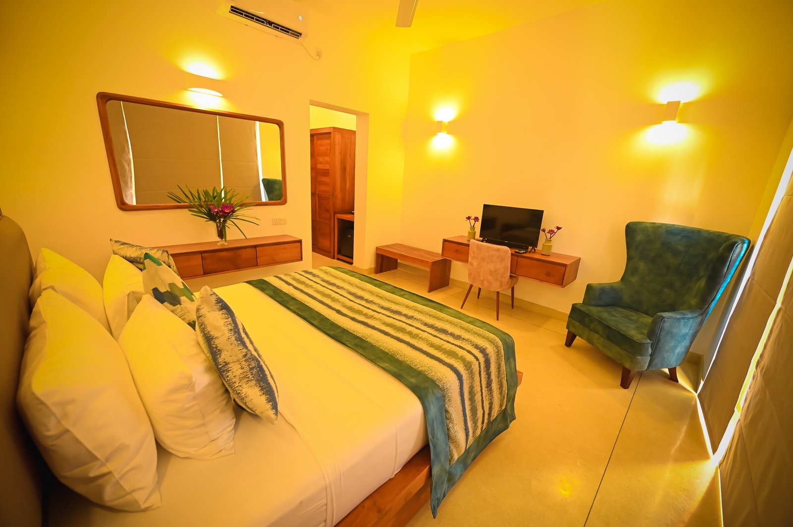 Deluxe Room interior, warm evening light